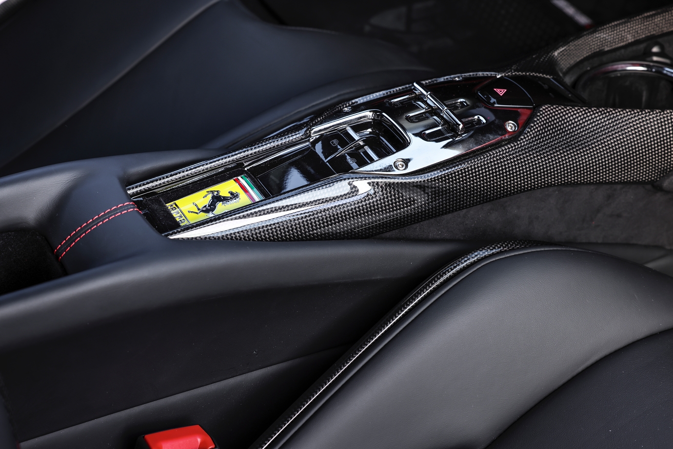 Transmission selector is intended to echo the signature open-gate shifters of manual Ferraris